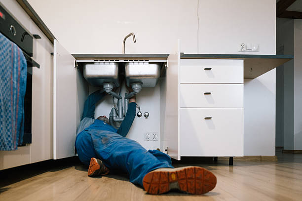 Professional Drain Cleaning technician working in Norton, KS